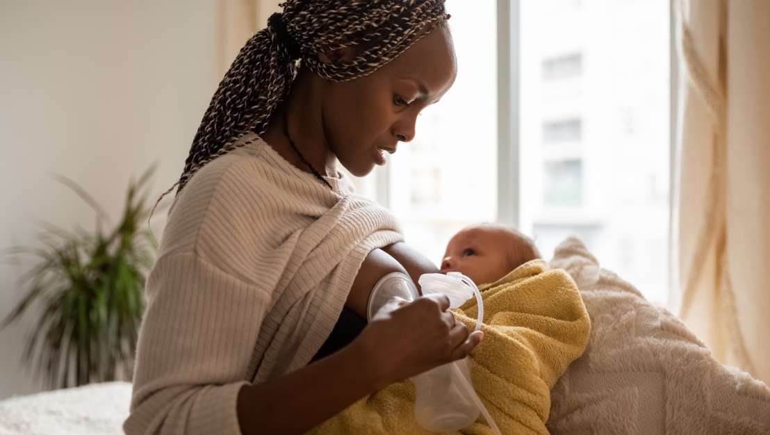 Woman breastfeeding baby